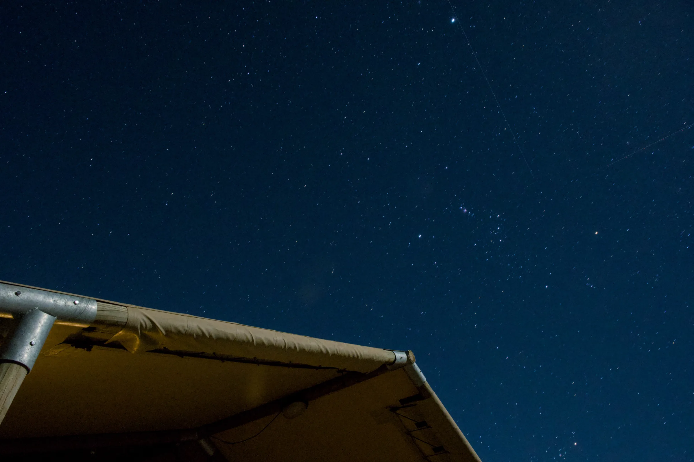Starry night sky above the glamping tent at AfriCamps Karoo